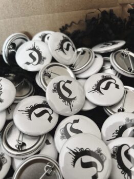 WHITE PIN BADGE WITH NEW Clödie LOGO